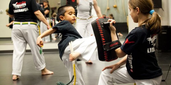 A young boy learning integrity through training. 