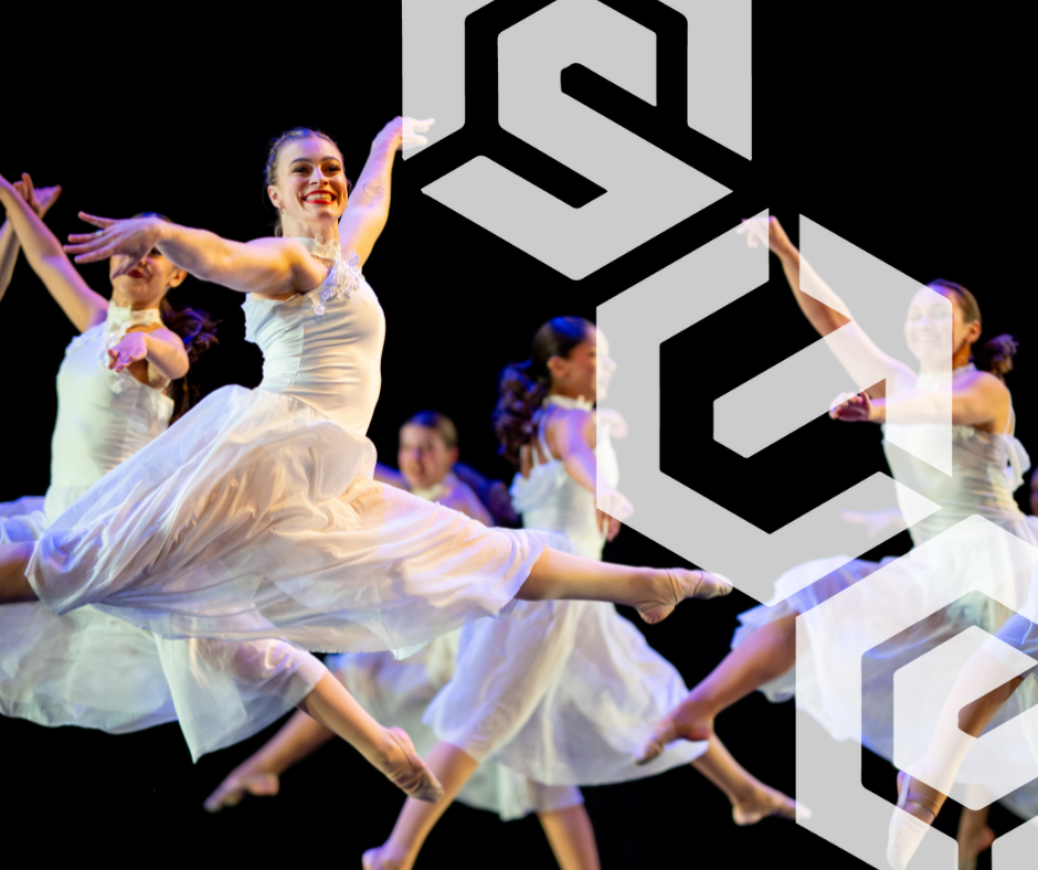 Dancers performing on stage with the Compete Services logo overlayed