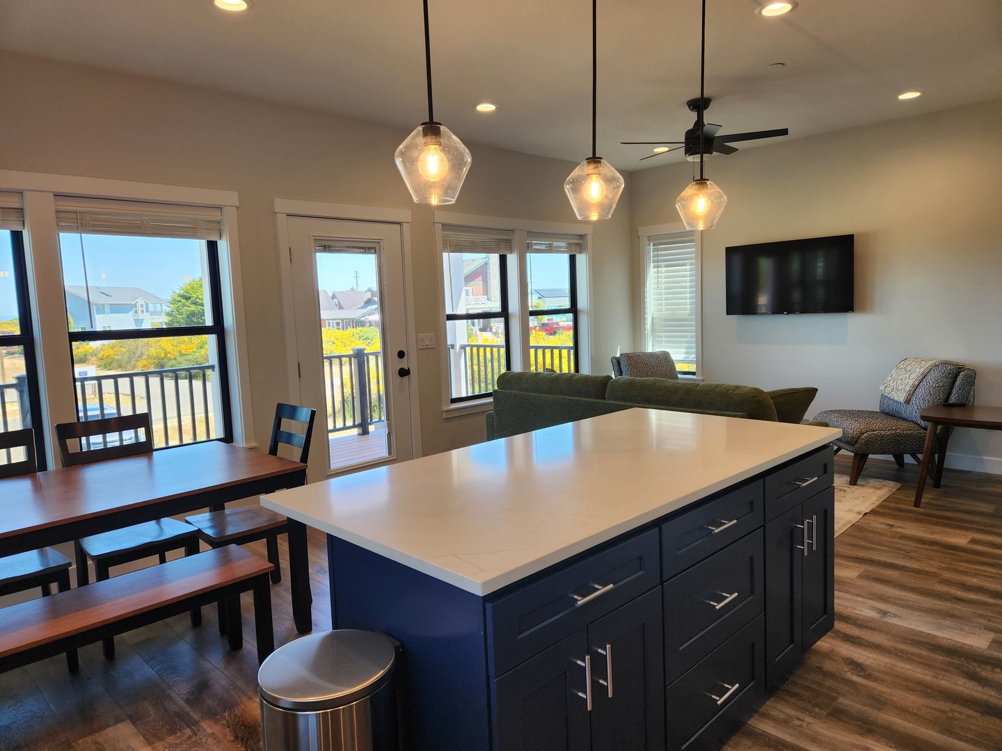 An image of the kitchen and large windows overlooking the Ocean Shores neighborhood