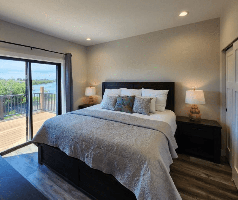 The primary suite with a king-sized bed and private sunning deck