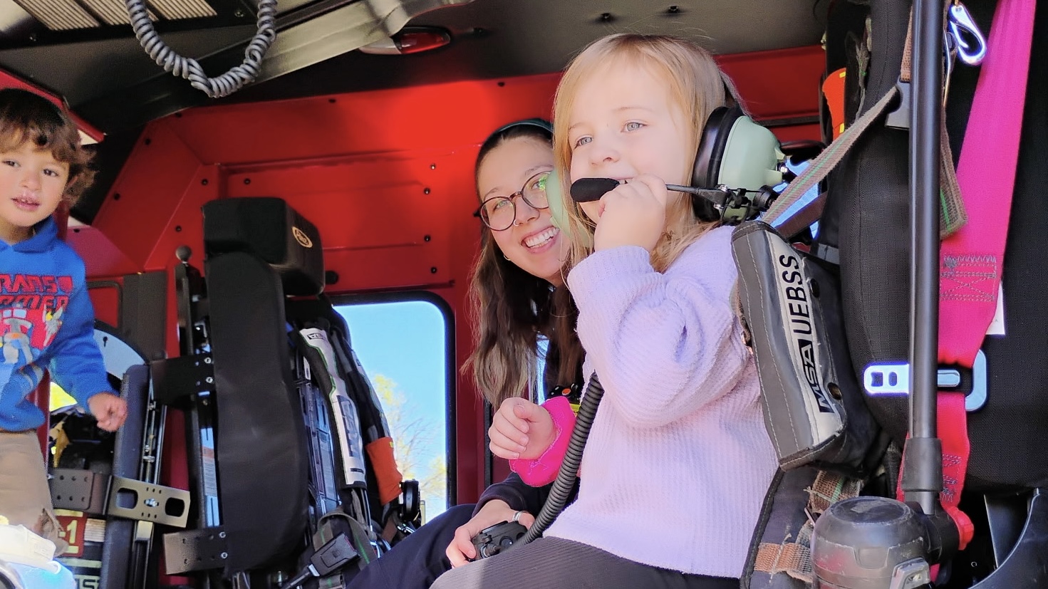 Child in fire truck 