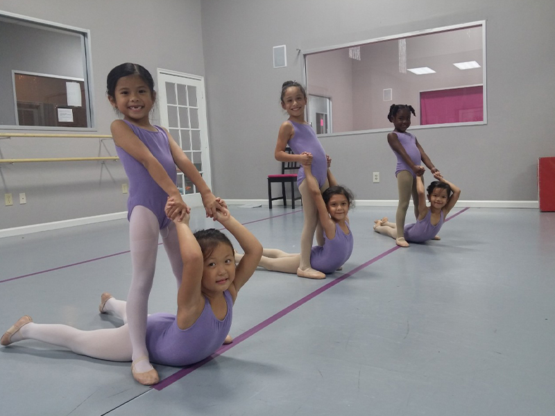 Dancers learning discipline in Academy classes