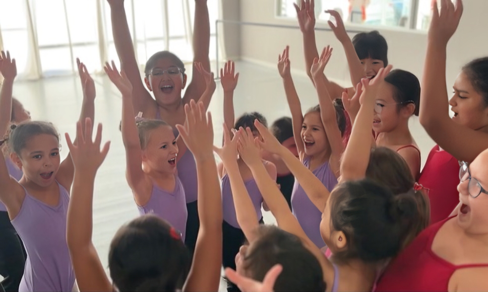 Academy dancers expressing their joy after class