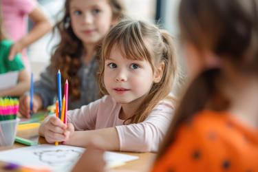 Bright, colorful classroom at Luminary Fine Arts Preschool with children engaged in arts activities